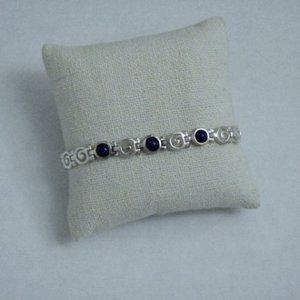 Sterling Silver Swirl Link with 3 Dark Blue Stones 7.25" Bracelet